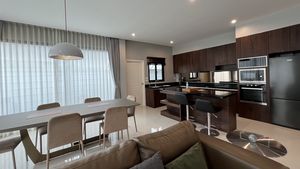 The dining-area and kitchen The dining-area and kitchen