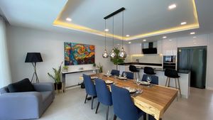 The dining-area with the open-plan kitchen