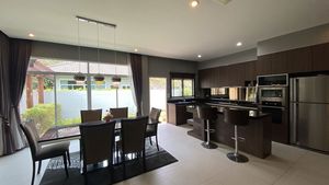 The dining-area with the open-plan kitchen