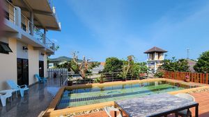 The green hills in the background of the pool-area