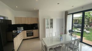 The kitchen and indoor dining area