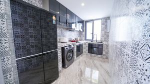 The kitchen is in a separate room