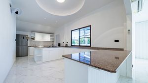 The kitchen offers plenty of storage space
