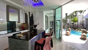 The kitchen with breakfast bar