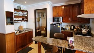 The kitchen with breakfast bar