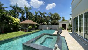 The large pool is made of black granite and bluish Balinese natural stone