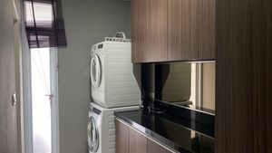 The laundry area with washing-machine and tumbler