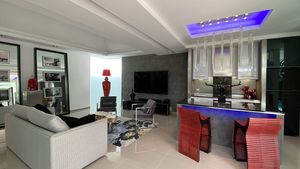 The living-area with the open-space kitchen