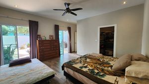 The master-bedroom with walk-in closet