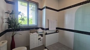 The property offers 4 spacious bathrooms