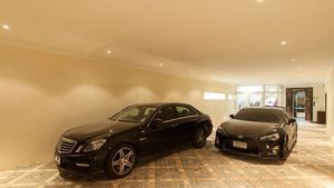 The remote-controlled garage holds 6 cars