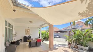 The terrace or carport area The terrace or carport area