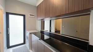 The utility room with washing-machine The utility room with washing-machine