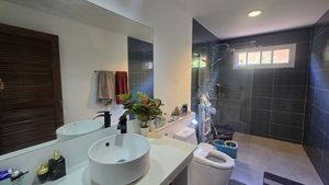 There are 2 chic bathrooms