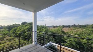 There are 2 generous balconies on the 2nd floor