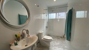 There are 3 bathrooms, all with a shower