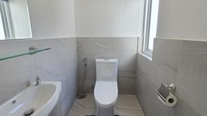 There are 3 bathrooms and a guest-toilet