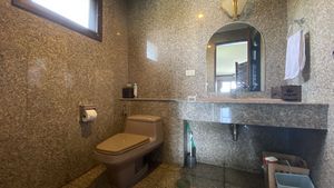 There are a total of 5 bathrooms