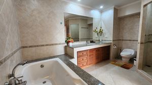 This bathroom offers a shower area plus Jacuzzi tub