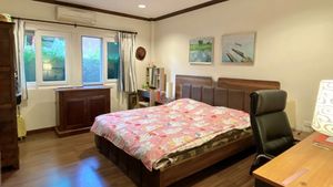 This bedroom also offers an office-corner