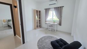 This bedroom comes as an office