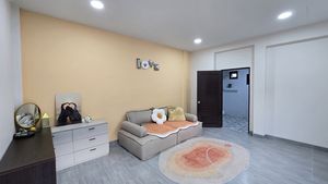 This bedroom offers a sofa bed