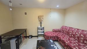 This upstairs lounge could be bedroom No. 6