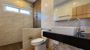 Two modern bathrooms are given