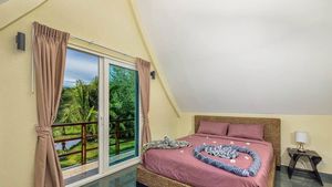 one of the two upstairs bedrooms