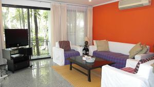 The nicely decorated lounge of this 3-bedroom home at Jomtien Yacht Club
